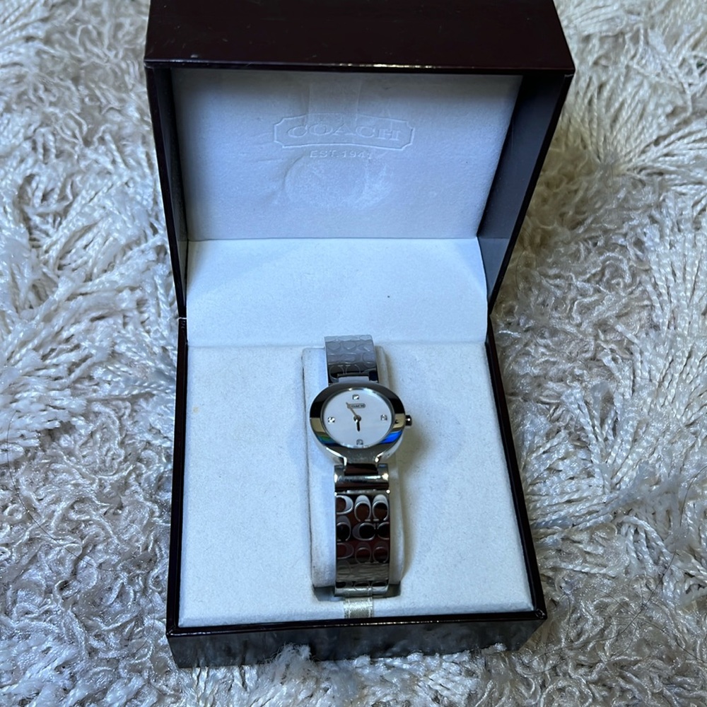 Coach Stainless Steel Bangle Watch with Engraved Signature "C" Logo